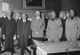 Chamberlani, Daladier, Hitler and Mussolini prepare to sign the Munich agreement (picture German Federal Archives)